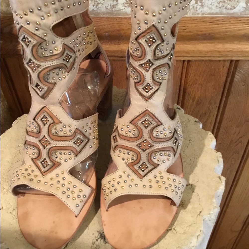 Gorgeous and dramatic leather cut out sandals